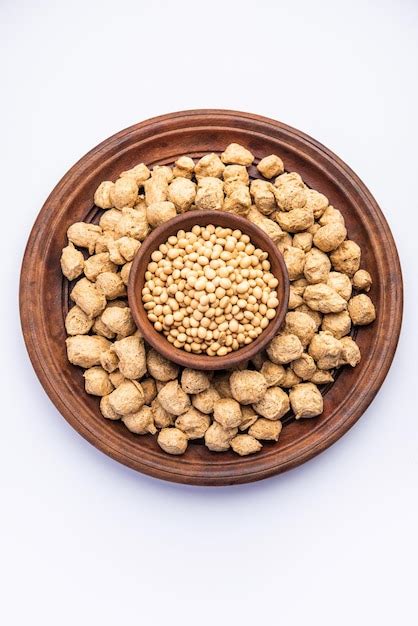 Premium Photo Glycine Max Or Soya Bean Or Uncooked Soybean Chunks