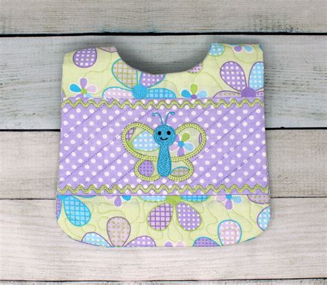 In The Hoop Butterfly Bib 7×11 · Omas Place Machine Embroidery Designs