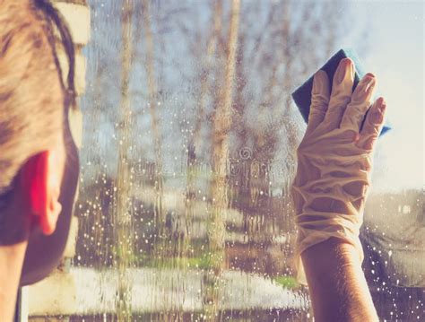 Spring Cleaning Cleaning Windows Women`s Hands Wash The Window