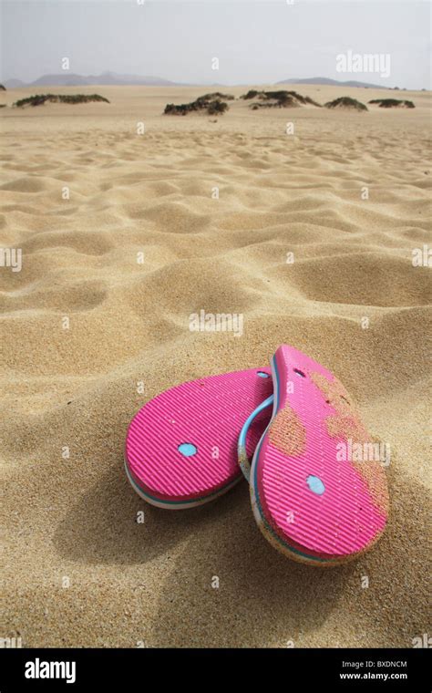 Flip Flop Sandals On Sandy Beach Stock Photo Alamy