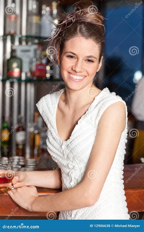 Young Woman with Hairstyle at Bar Smiling Stock Photo - Image of ...