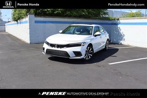 2024 New Honda Civic Hatchback EX L CVT At PenskeCars Serving