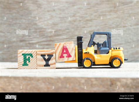 Toy Forklift Hold Letter Block A To Complete Word Fya Abbreviation Of