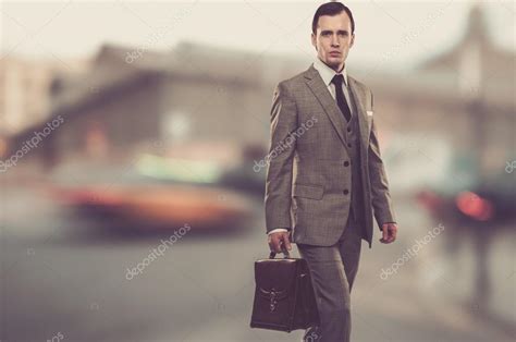 Man In Classic Grey Suit With Briefcase Outdoors Stock Photo Nejron