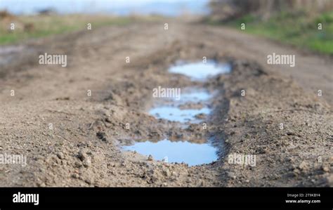 Muddy Earthy Road Shooting From Ground Level Countryside Landscape