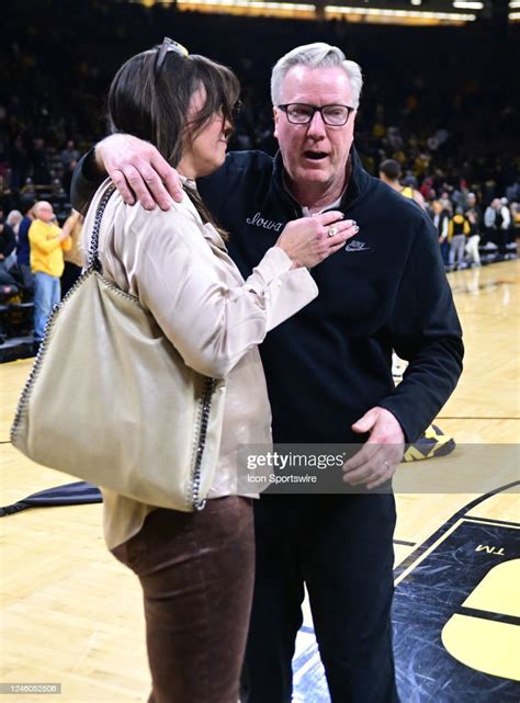 Iowa coach Fran McCaffery gets a hug from his wife, Margaret, after ...