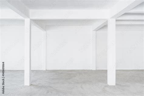 Empty Interior Loft Space Background White wall Building Concrete floor Stock Photo | Adobe Stock