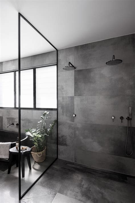 A Cloudy Grey Tile Sets The Palette For This Bathroom