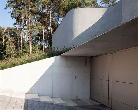 Office O Architects Sculpts Villa Mq From Curved Concrete Architect