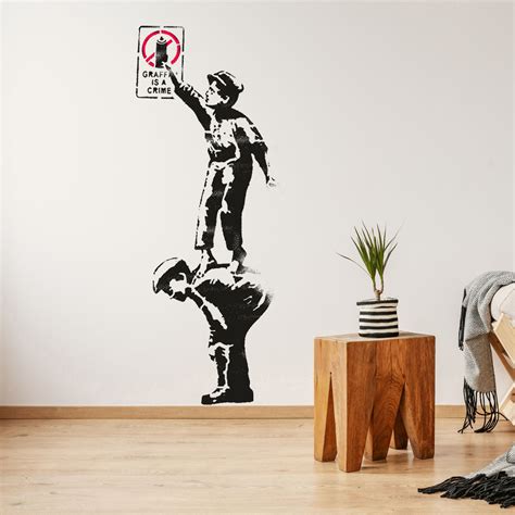 Banksy Graffiti is a crime Stencil , 2 kids spray can Painting Stencil ...