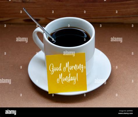 Morning greetings text on yellow notepad on coffee cup - Good morning ...