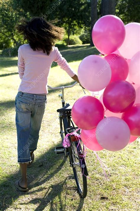 Woman With A Bicycle And Balloons Stock Image F001 2671 Science