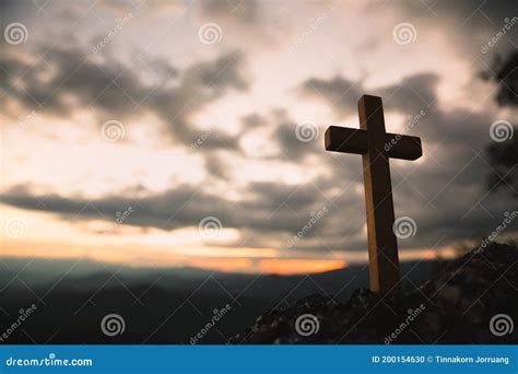 Religious Concepts. Christian Wooden Cross on a Background with Dramatic Lighting, Jesus Christ ...