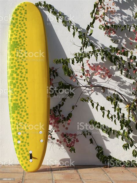 Surfboard Leaning Against A Wall Stock Photo Download Image Now