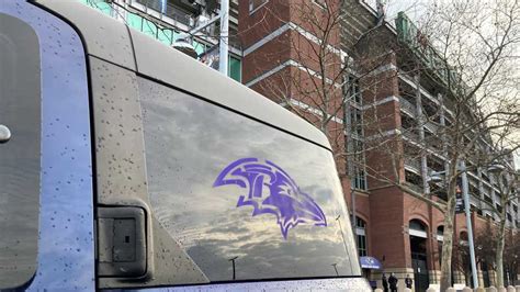 Ravens stencil team logo across Baltimore ahead of playoffs