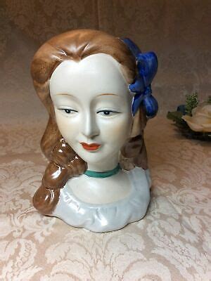 Brown Paint Head Vase Head Shapes Blue Bow Yard Sale Wall Plaques