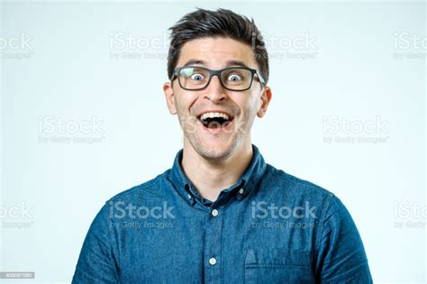 Man With Shocked Amazed Expression Isolated On Gray Background Stock