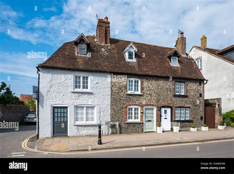 Early Th Century Grade Ii Listed Terraced Cottages With Nodular Flint