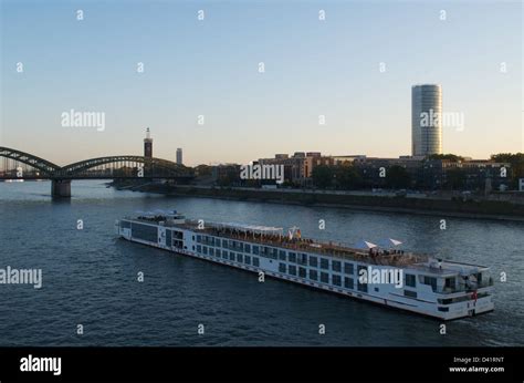 A river cruise boat on the Rhine at Cologne Stock Photo - Alamy