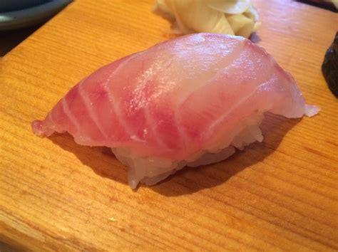 Sushi Izumidai Avocado Slices And Mango Ceviche As The Base With Red