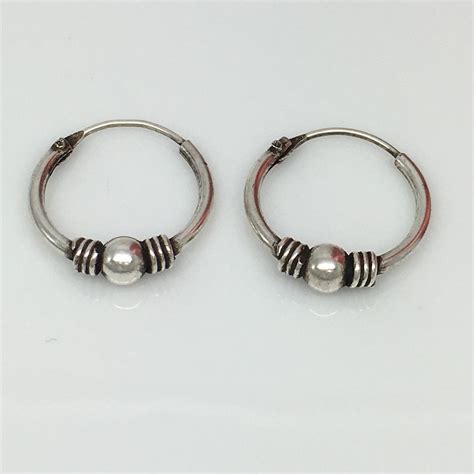 Hammered Silver Hoop Earrings - Sacheverell Pei