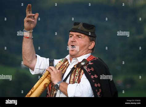 Slovak Folk Musician In Traditional Costume Singing A Pastoral Song He