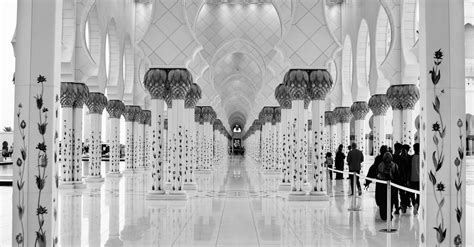 People Standing On The Aisles Inside A Building · Free Stock Photo