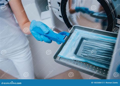 Sterilizing Medical Instruments In Autoclave Dental Office Stock Image