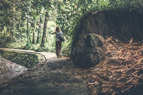 Woman In The Deep Rainforest Tropical Jungle Bali Island Indonesia