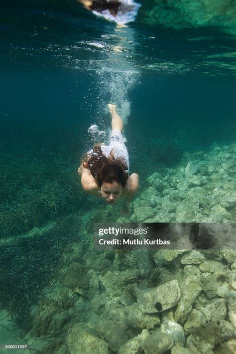 Young Woman Diving High Res Stock Photo Getty Images