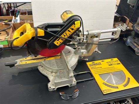 Dewalt DW708 compound mitre saw, new extra blade, safety glasses - Bid ...