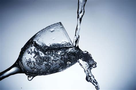 Premium Photo Image Of Pouring Water Into A Glass