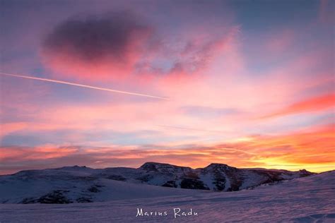 Sunrise Over Snowy Mountains