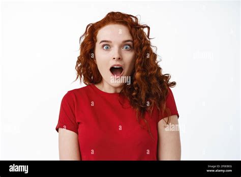 Wow So Cool Excited And Surprised Young Ginger Girl Drop Jaw And Gasping Fascinated Staring