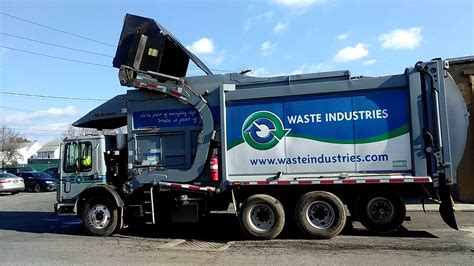 Waste Industries Truck Collecting Recycling Youtube