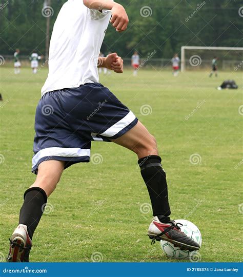 Kicking the Ball stock photo. Image of speed, strength - 2785374