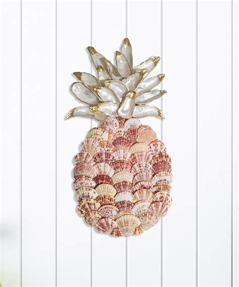 A Pineapple Shaped Object With Seashells On It S Side Hanging From A