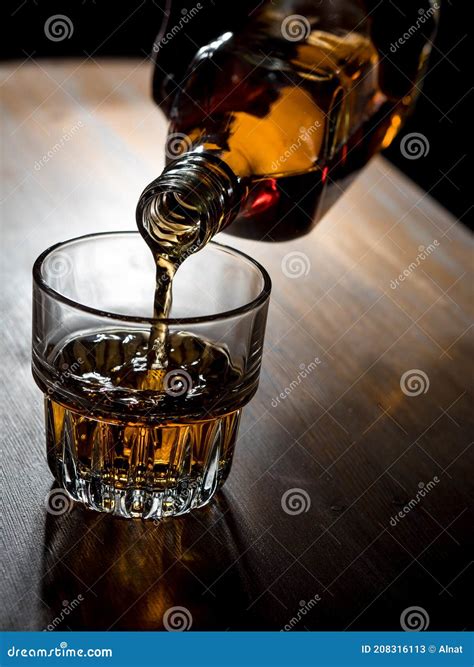 Pouring Whisky Into A Glass Stock Image Image Of Pour Golden 208316113