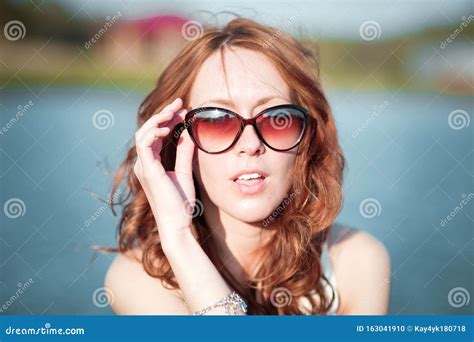 Redhead Girl In Sunglasses Close Up Emotions Young Redhead Girl