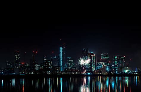 Aerial Of City Near Body Of Water During Nighttime Hd Wallpaper Peakpx