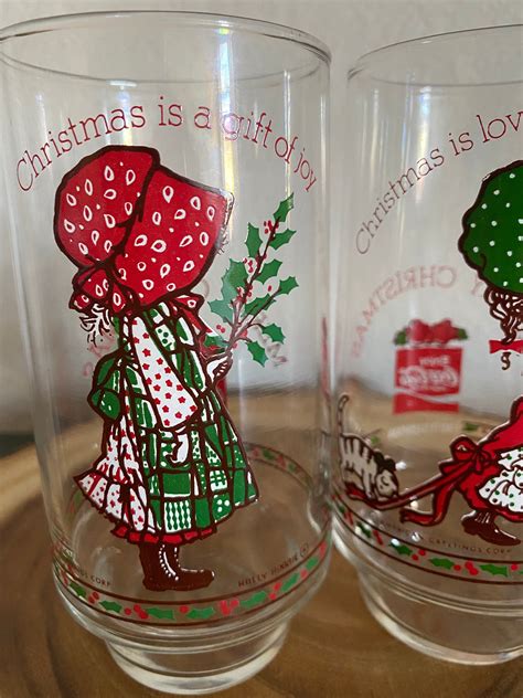 Vintage 1977 Coca Cola Glasses Set Of Two 2 Holly Hobbie Christmas Is A