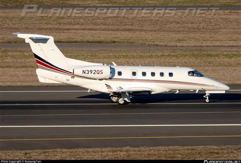 N Qs Netjets Aviation Embraer Phenom Emb Photo By Ruoyang