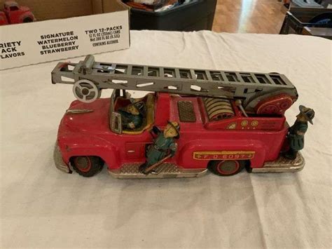 Vintage battery operated tin fire engine toy - Legacy Auction Company