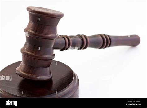 Wooden Judge Gavel And Wooden Stand On A White Background Stock Photo