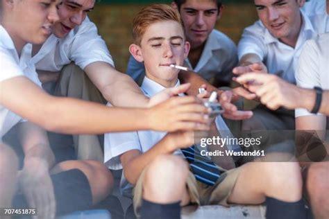 Boys Smoking Cigarettes Photos and Premium High Res Pictures - Getty Images