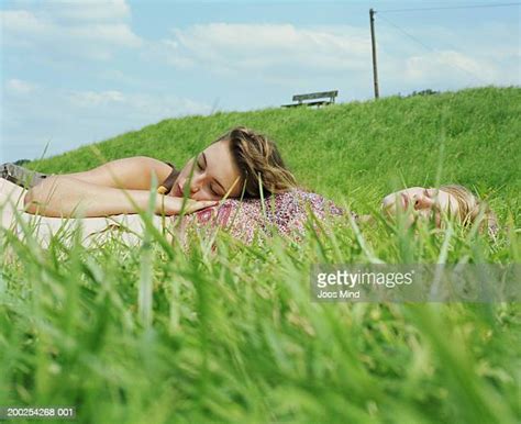 Couples Sleeping On Grass Photos And Premium High Res Pictures Getty Images