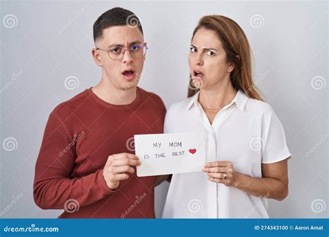 Mother And Son Holding My Mom Is The Best Card In Shock Face Looking Skeptical And Sarcastic