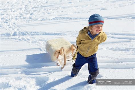 Kids playing in the snow — shadow, cold - Stock Photo | #169011488