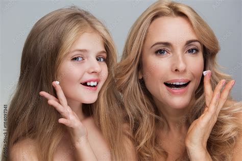 Love This Cream Portrait Of Overjoyed Mother And Her Adorable Little Daughter Are Standing With