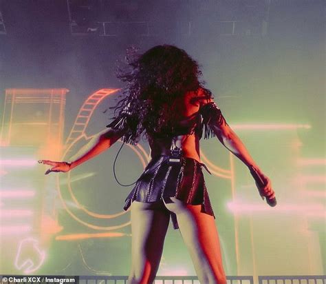 Charli Xcx Puts On A Sultry Display In An Ab Flashing Skimpy Black